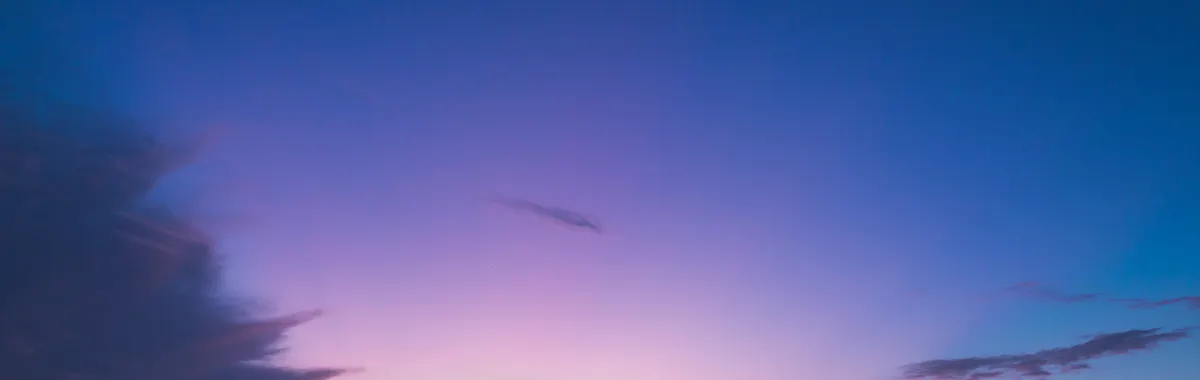 Beautiful dusk sky over Santiago de los Caballeros with vibrant colors.