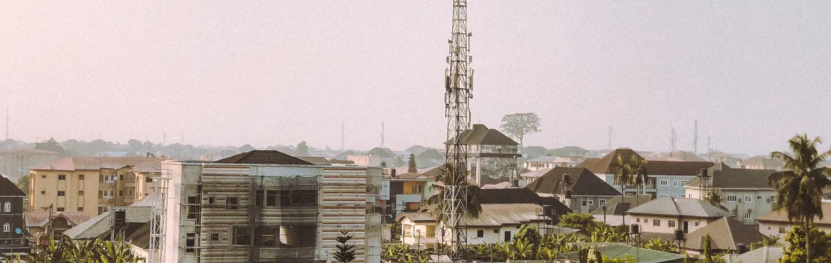 Explore the urban landscape of Port Harcourt, Nigeria with distinct buildings and lush greenery.