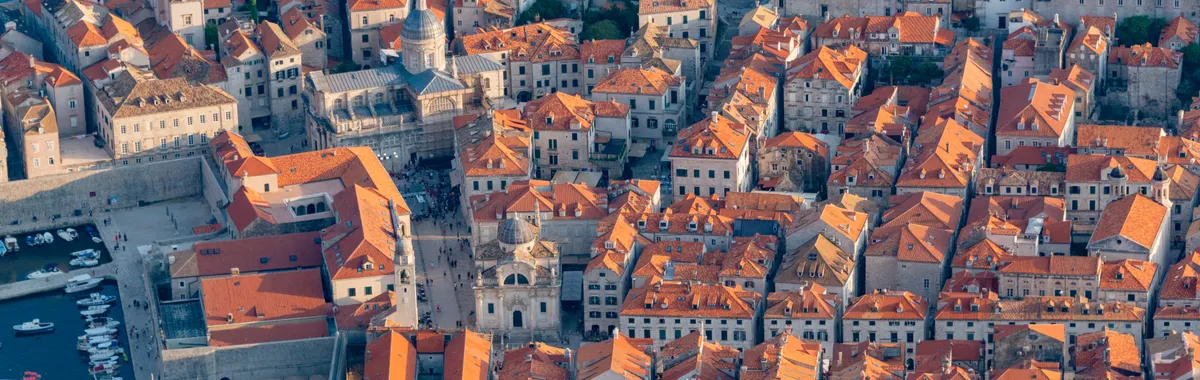 Stunning aerial capture of Dubrovnik's Old Town and majestic Adriatic Sea coastline.