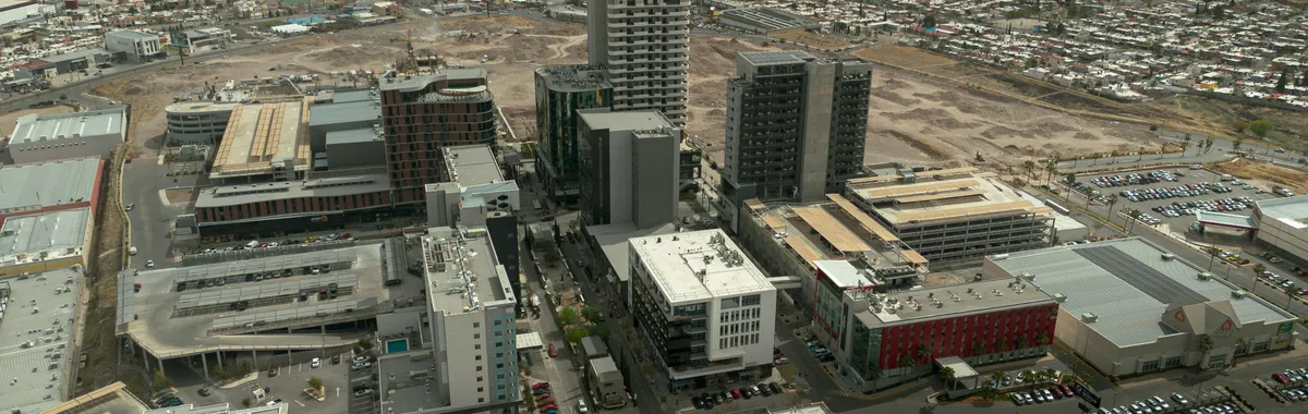 Discover the bustling cityscape of Chihuahua, Mexico, showcasing modern architecture and urban development.