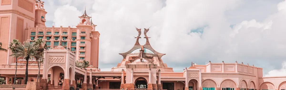 Beautiful architecture of Atlantis Paradise Island with luxury yachts in Nassau, Bahamas.