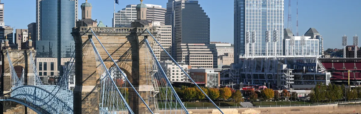 Stunning view of Cincinnati skyline featuring the historic Roebling Suspension Bridge.