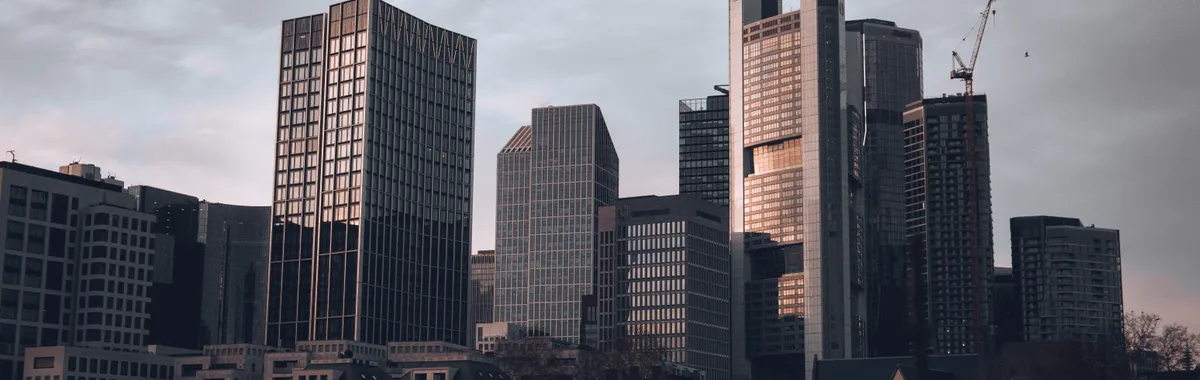 Stunning cityscape of Frankfurt am Main skyline at dusk with modern skyscrapers.