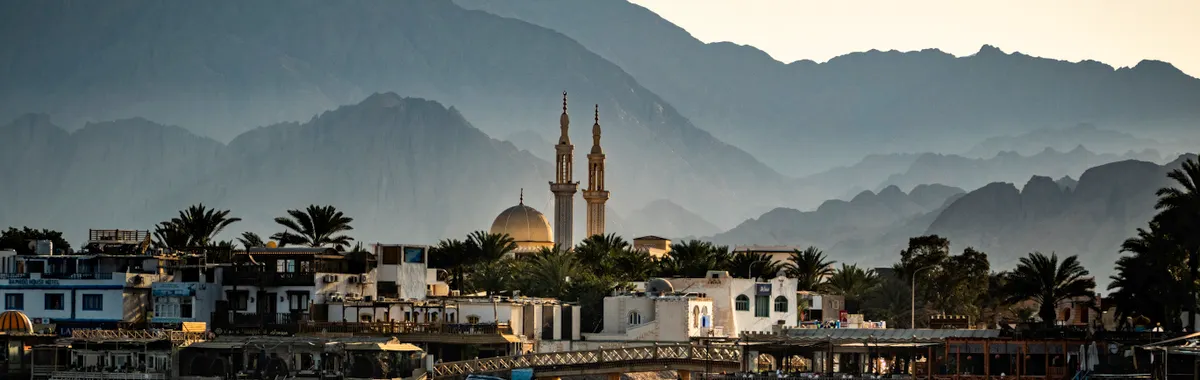 Beautiful mosque with mountains in the background, Dahab, Egypt.
