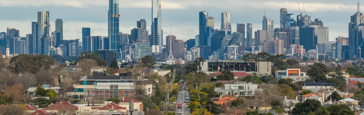 A view of Melbourne's skyline as seen from Hawthorn, showcasing prominent skyscrapers and urban landscape.