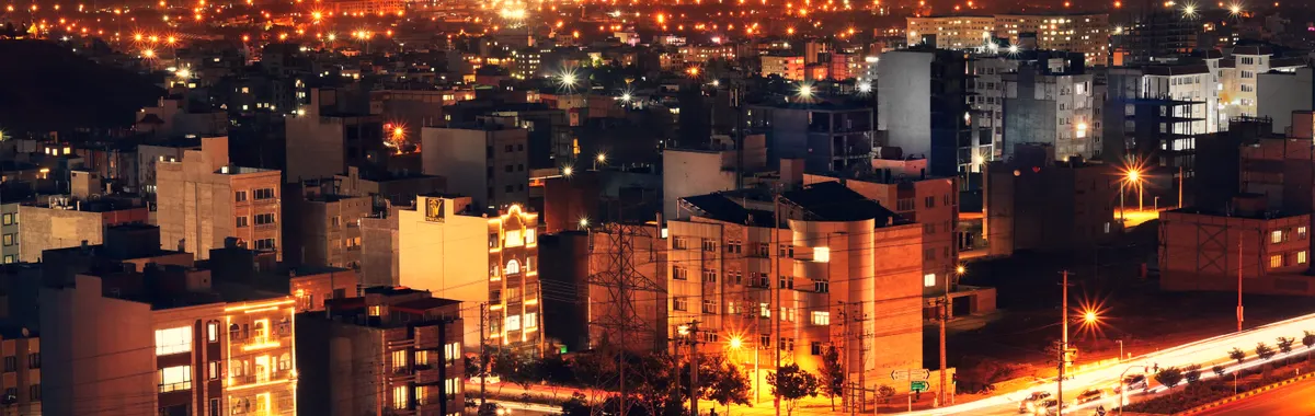 A breathtaking aerial view of Mashhad city lights at night, showcasing the urban landscape of Iran.