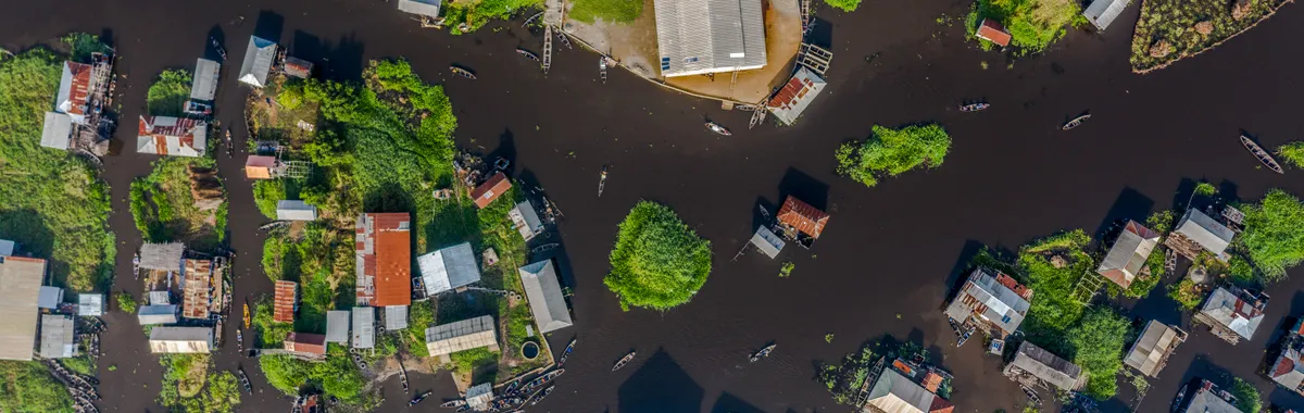 Drone view of Ganvié, a traditional stilt village on Lake Nokoué, Cotonou, Benin.